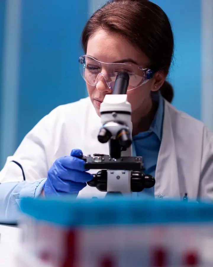 Lab technician testing a batch
